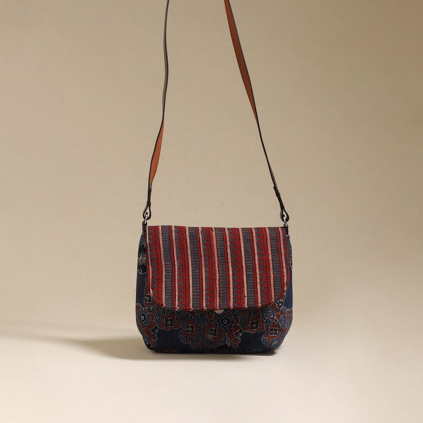 Handcrafted quilted ajrakh block printed fabric sling bag