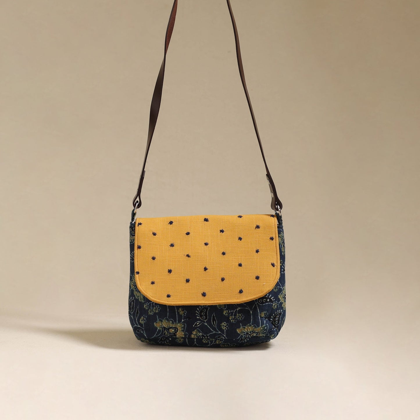 Handcrafted quilted ajrakh block printed fabric sling bag