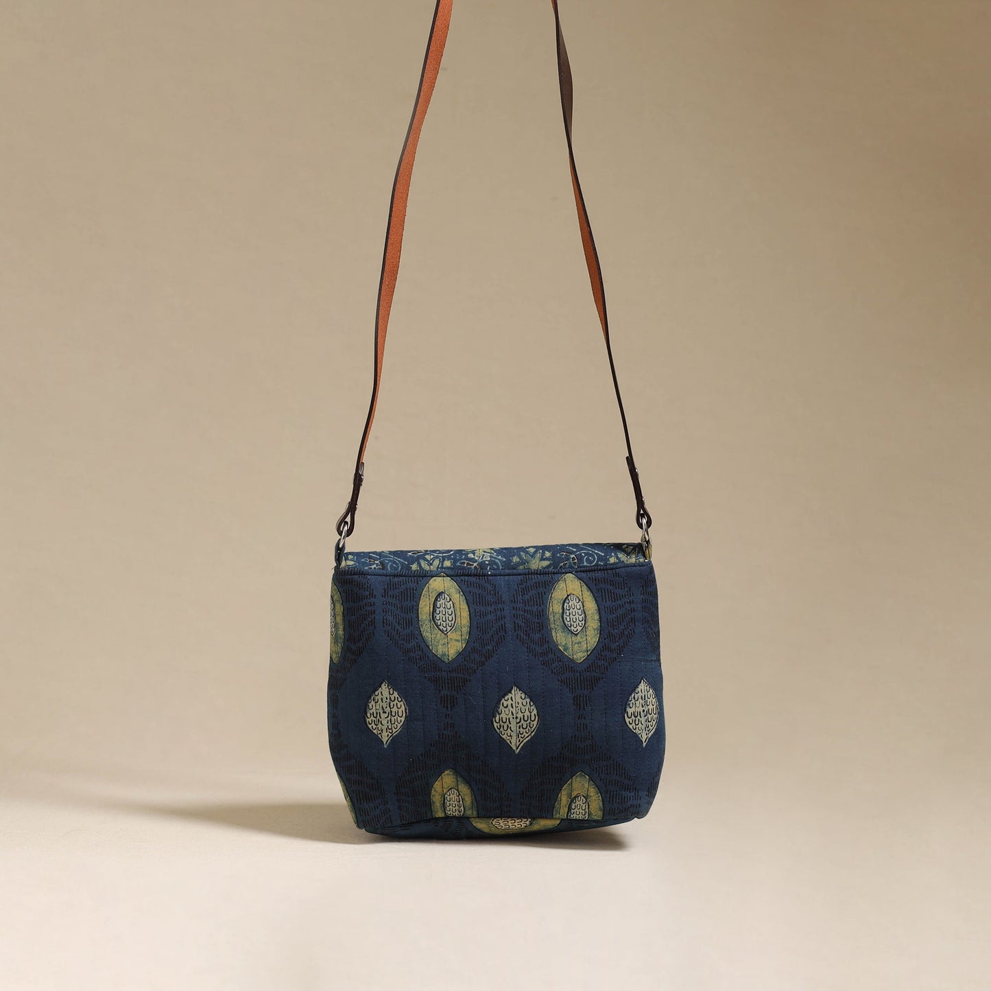 Handcrafted quilted ajrakh block printed fabric sling bag