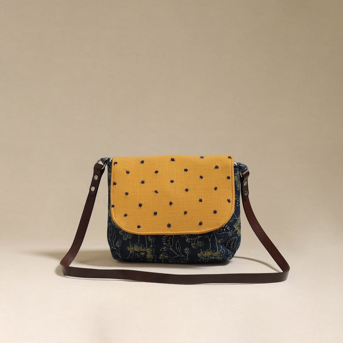 Handcrafted quilted ajrakh block printed fabric sling bag