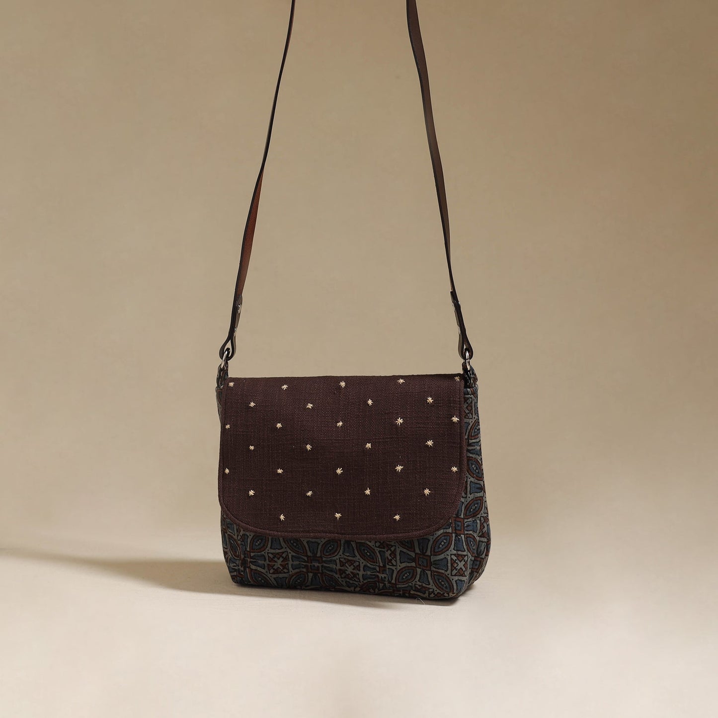 Handcrafted quilted ajrakh block printed fabric sling bag