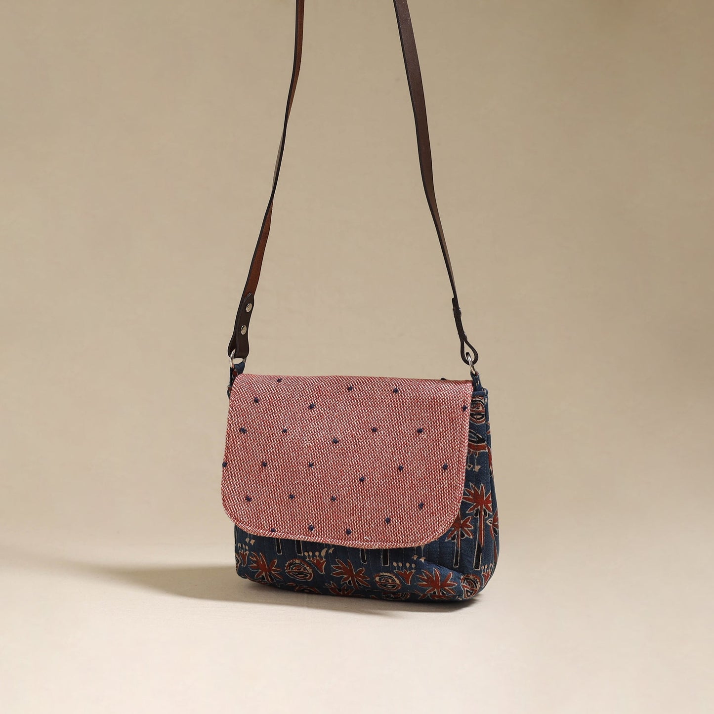 Handcrafted quilted ajrakh block printed fabric sling bag
