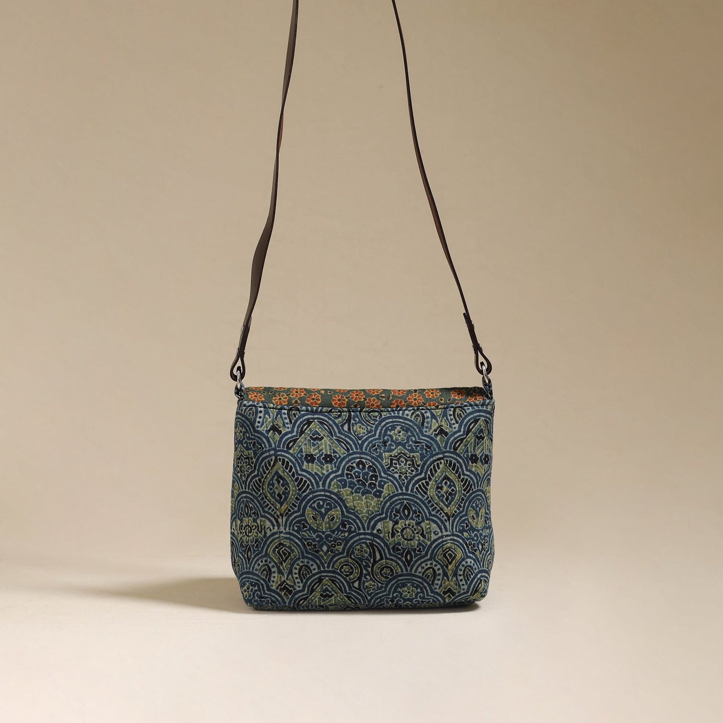Handcrafted quilted ajrakh block printed fabric sling bag