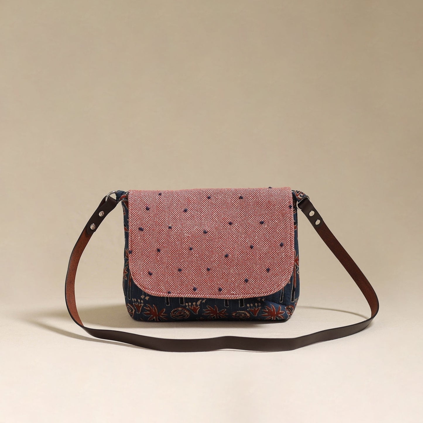 Handcrafted quilted ajrakh block printed fabric sling bag