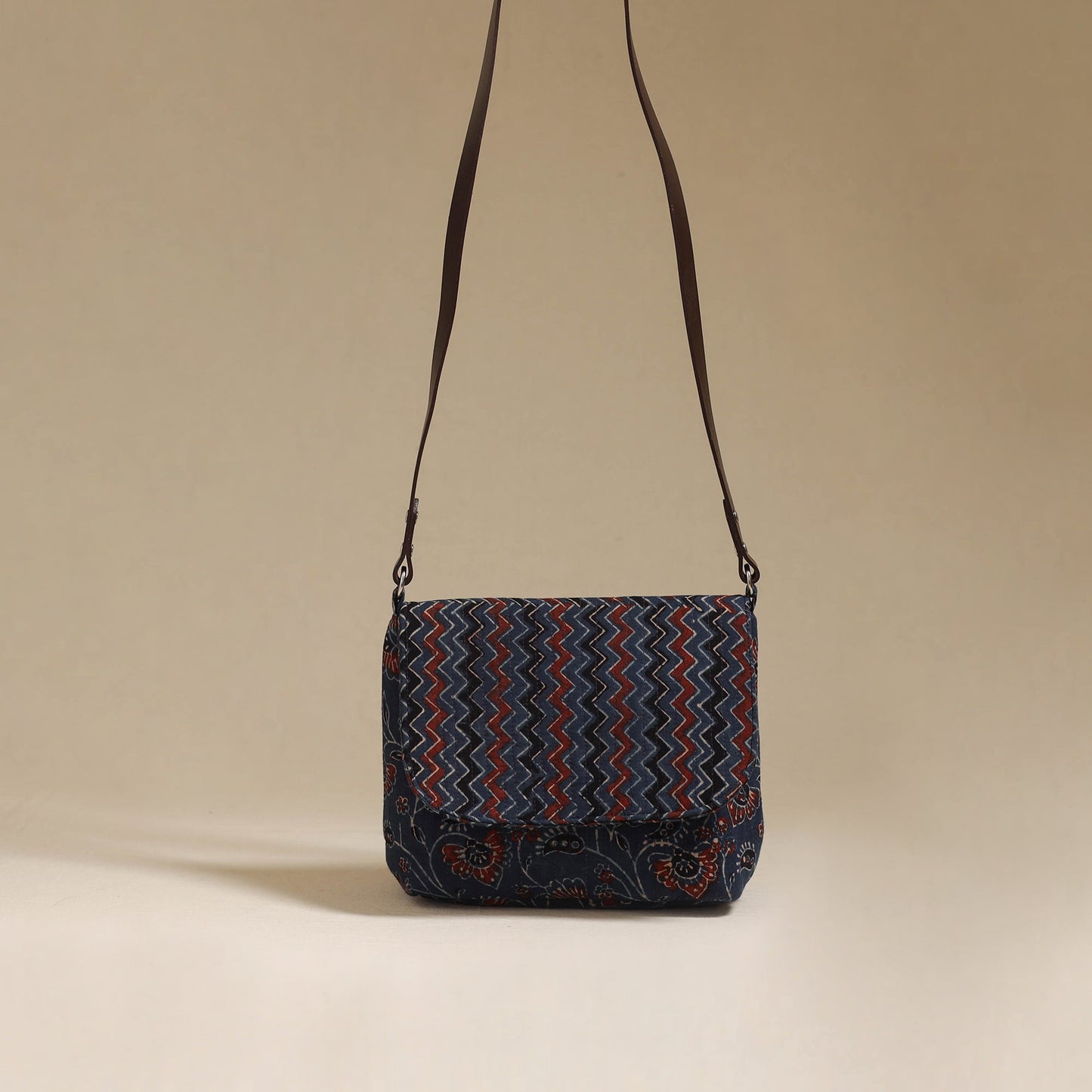 Handcrafted quilted ajrakh block printed fabric sling bag