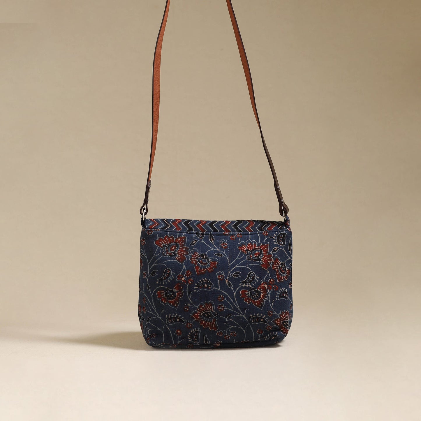 Handcrafted quilted ajrakh block printed fabric sling bag