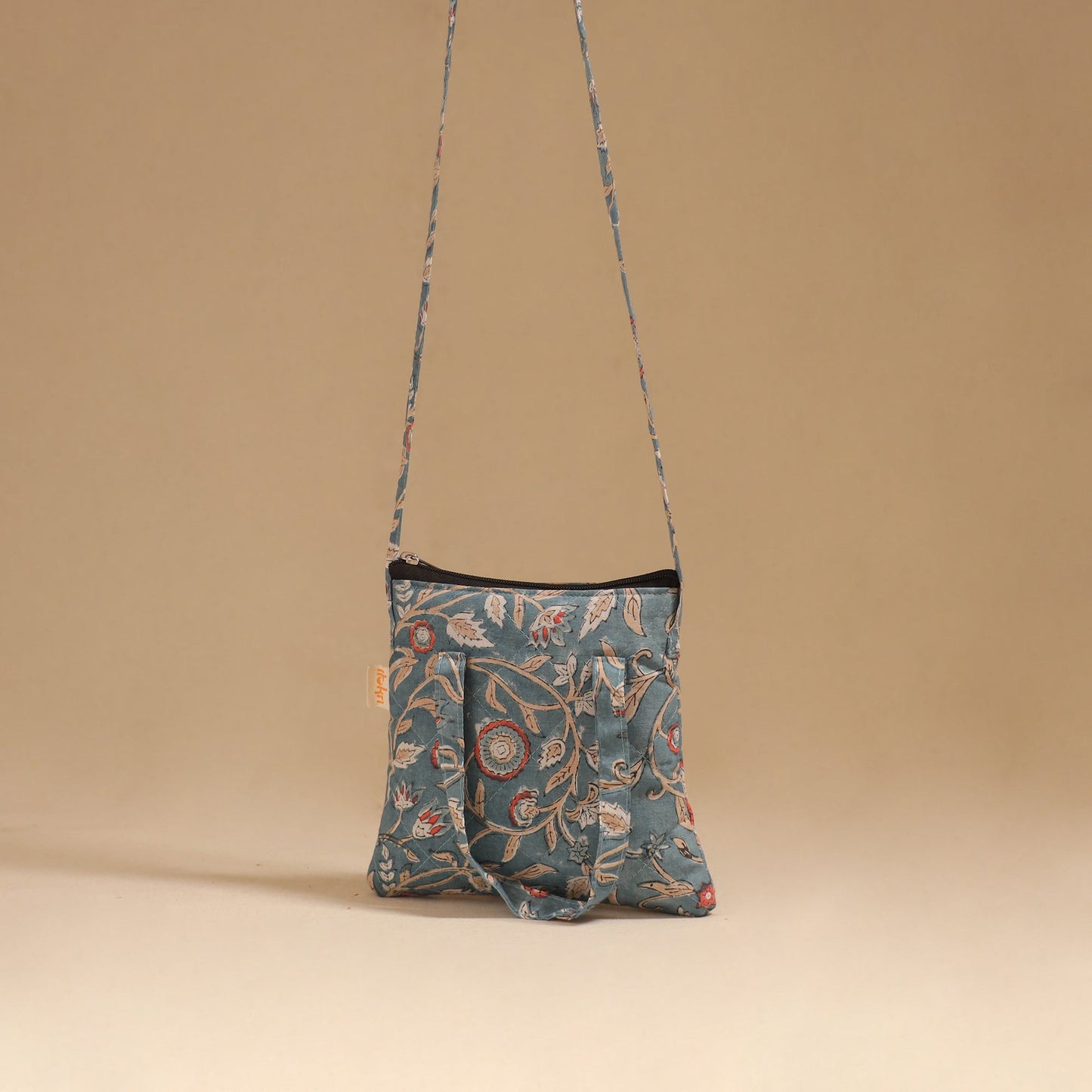 Handcrafted quilted sling bag 02