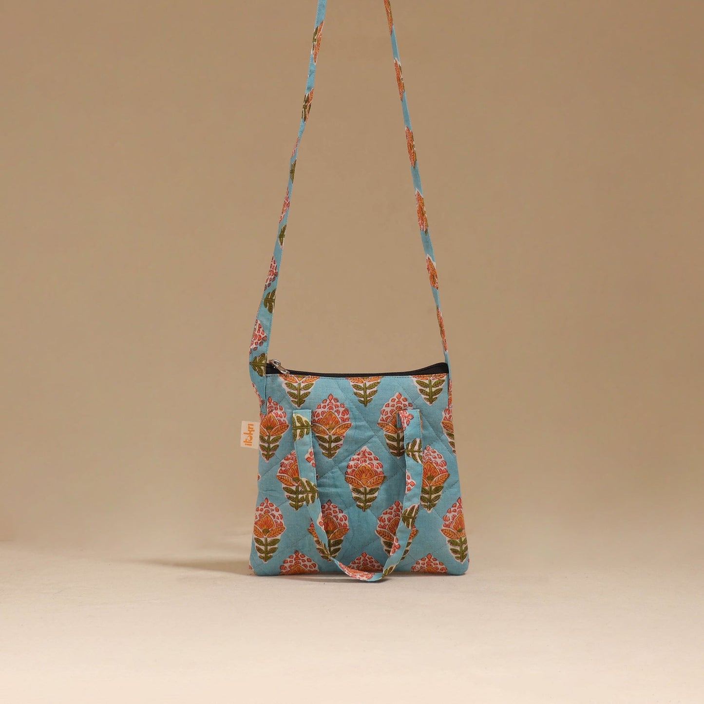 Handcrafted quilted sling bag 11