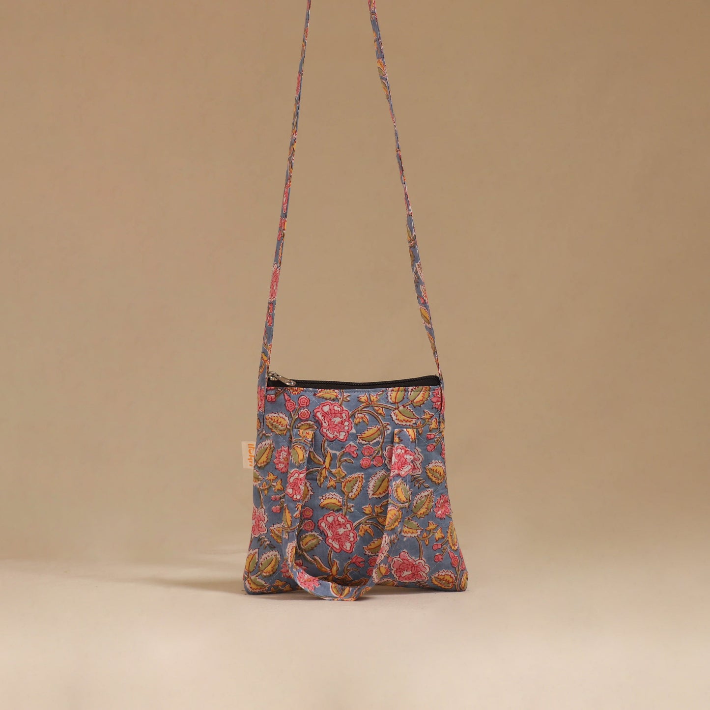 Handcrafted quilted sling bag 14