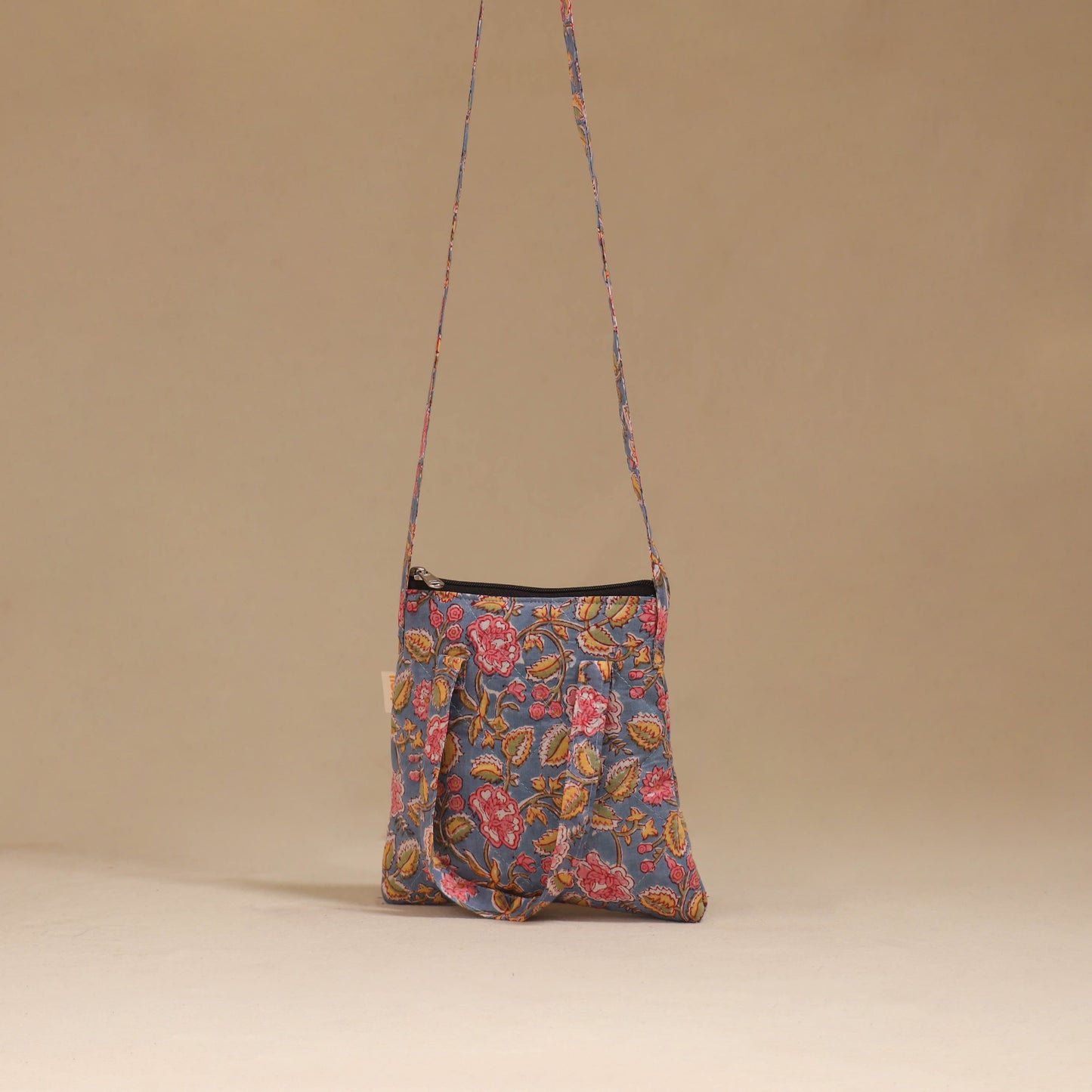 Handcrafted quilted sling bag 14