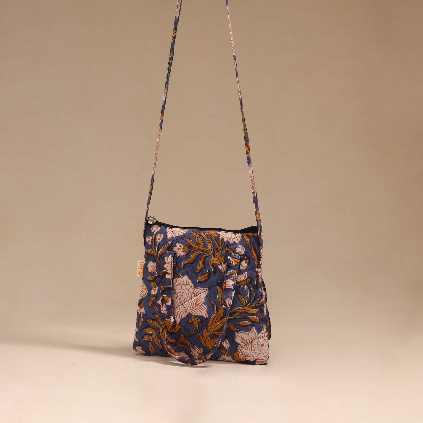 Handcrafted quilted sling bag 15