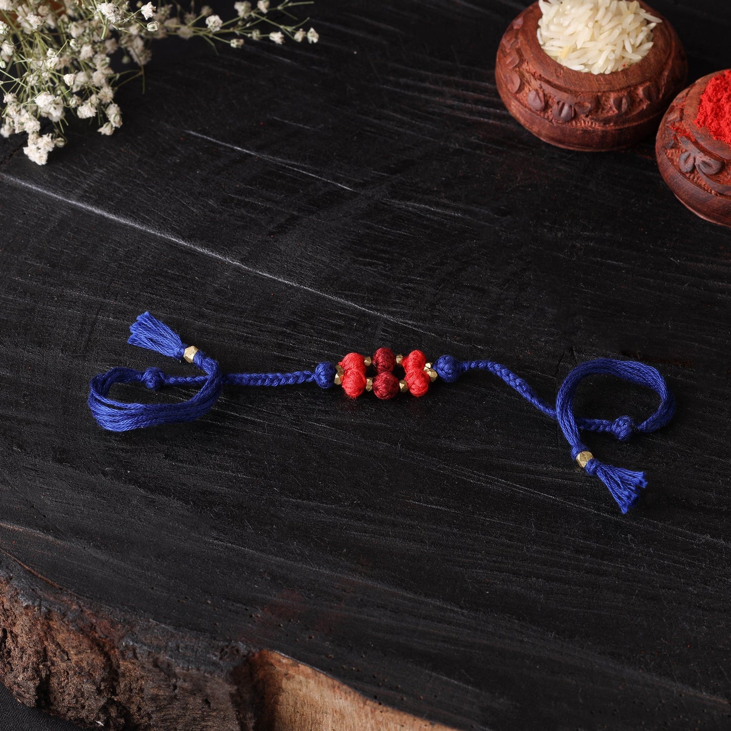 Handcrafted tribal dokra brass thread rakhi 50