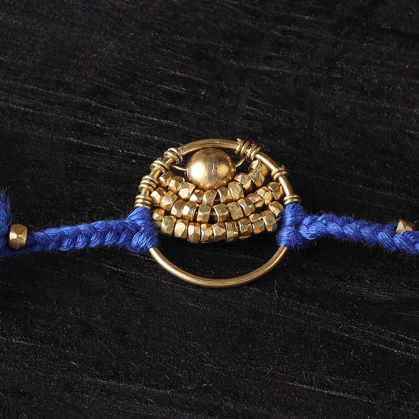 Handcrafted tribal dokra brass thread rakhi 56