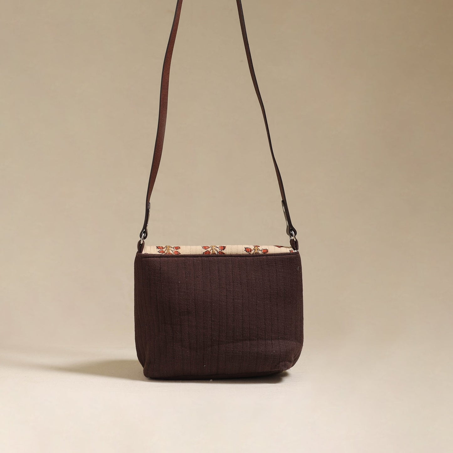 Handcrafted quilted ajrakh block printed fabric sling bag