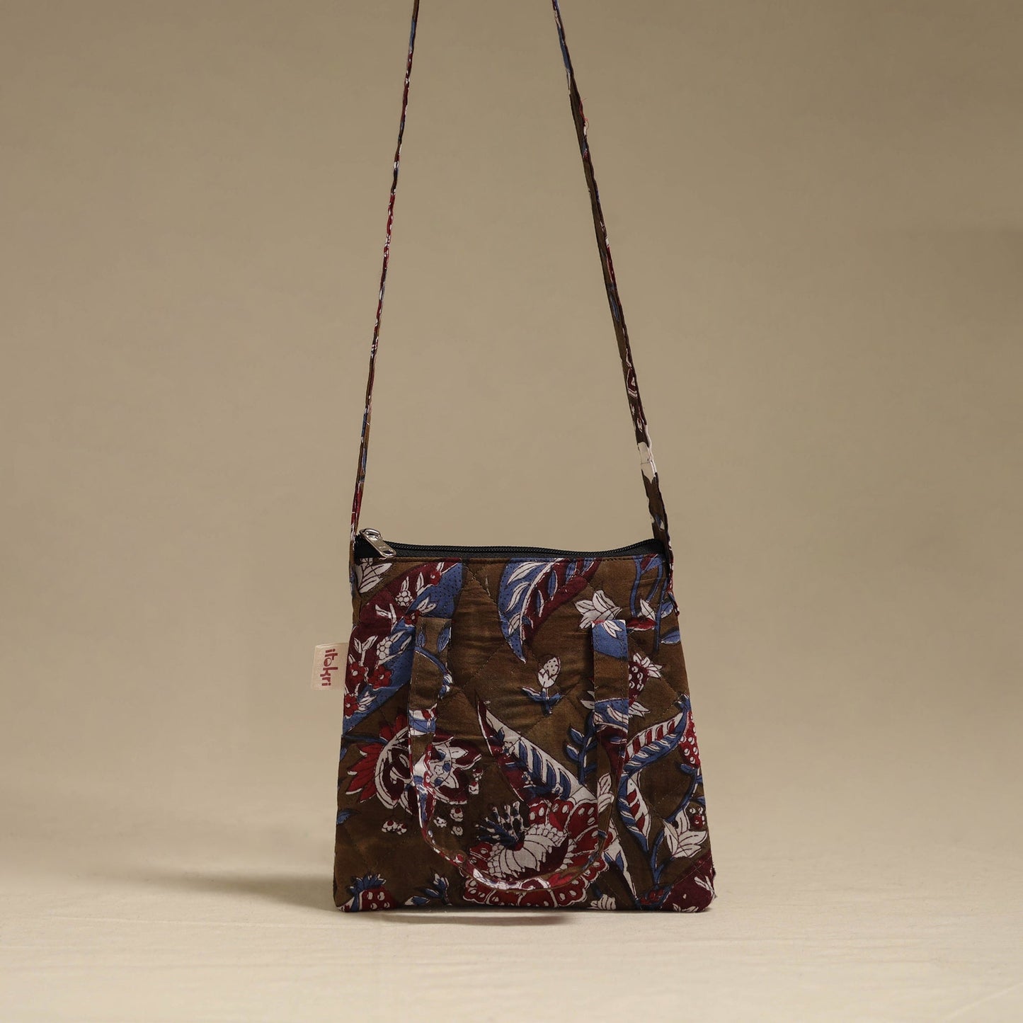 Handcrafted quilted sling bag 12