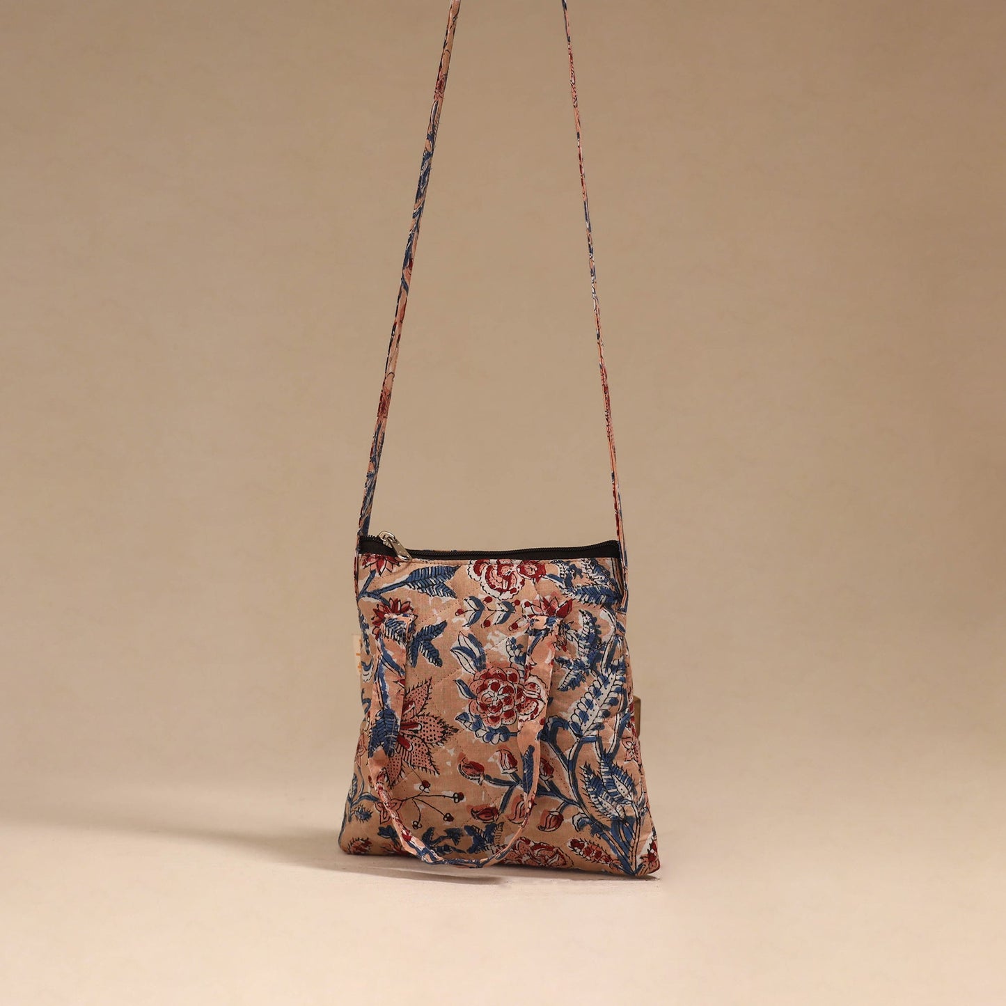 Handcrafted quilted sling bag 14