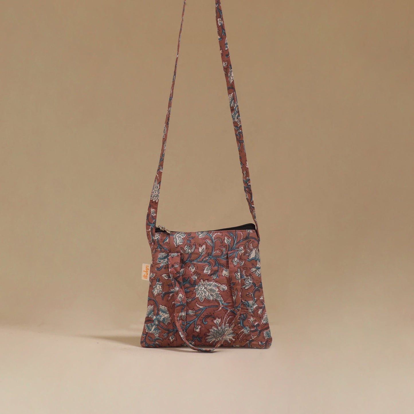 Handcrafted quilted sling bag 16
