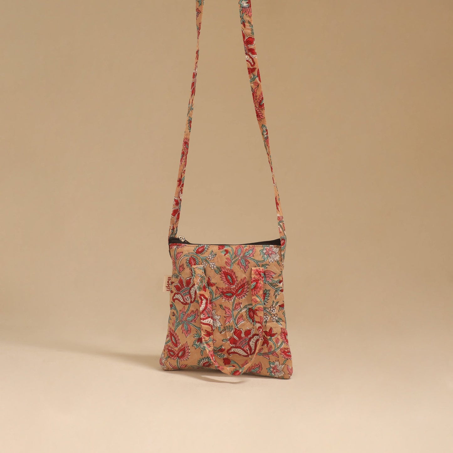 Handcrafted quilted sling bag 26