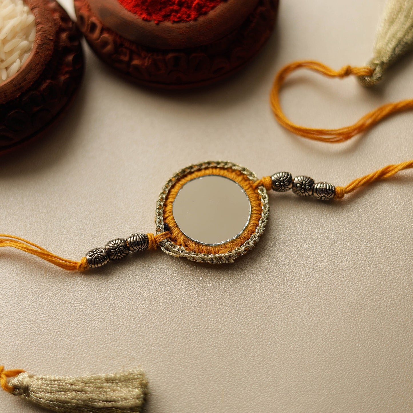 Chakra - Mirror & Crochet Work Rakhi by Abira Creations