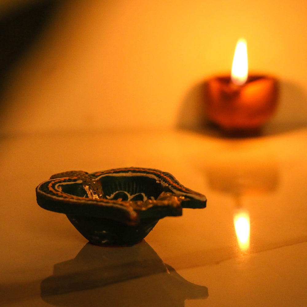 Decorative Handpainted Terracotta Diya (Set of 4) Online in India l iTokri.com