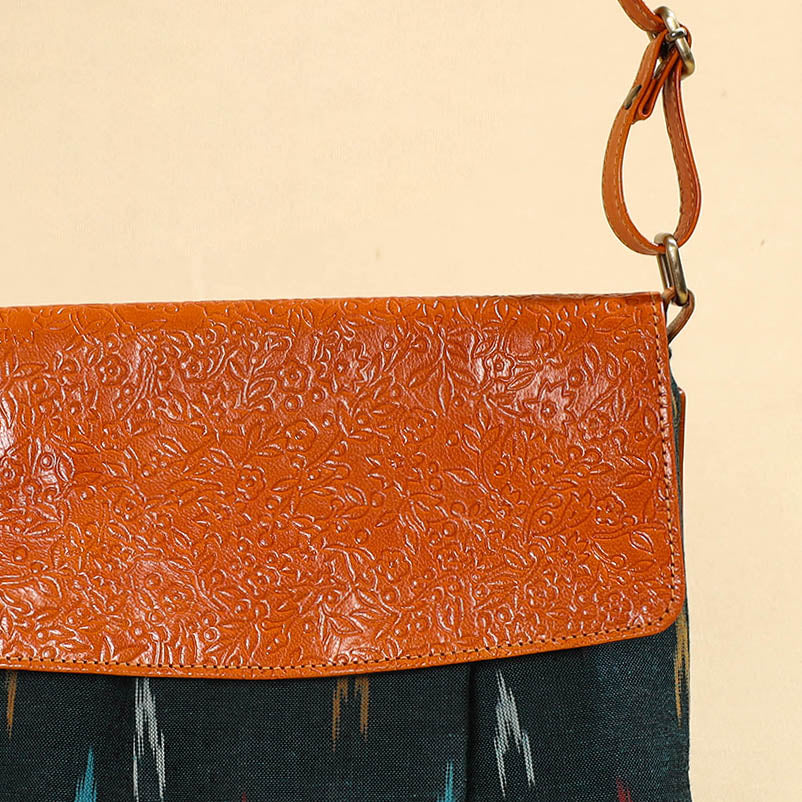 Handcrafted Ikat Fabric Sling Bag with Embossed Leather Flap