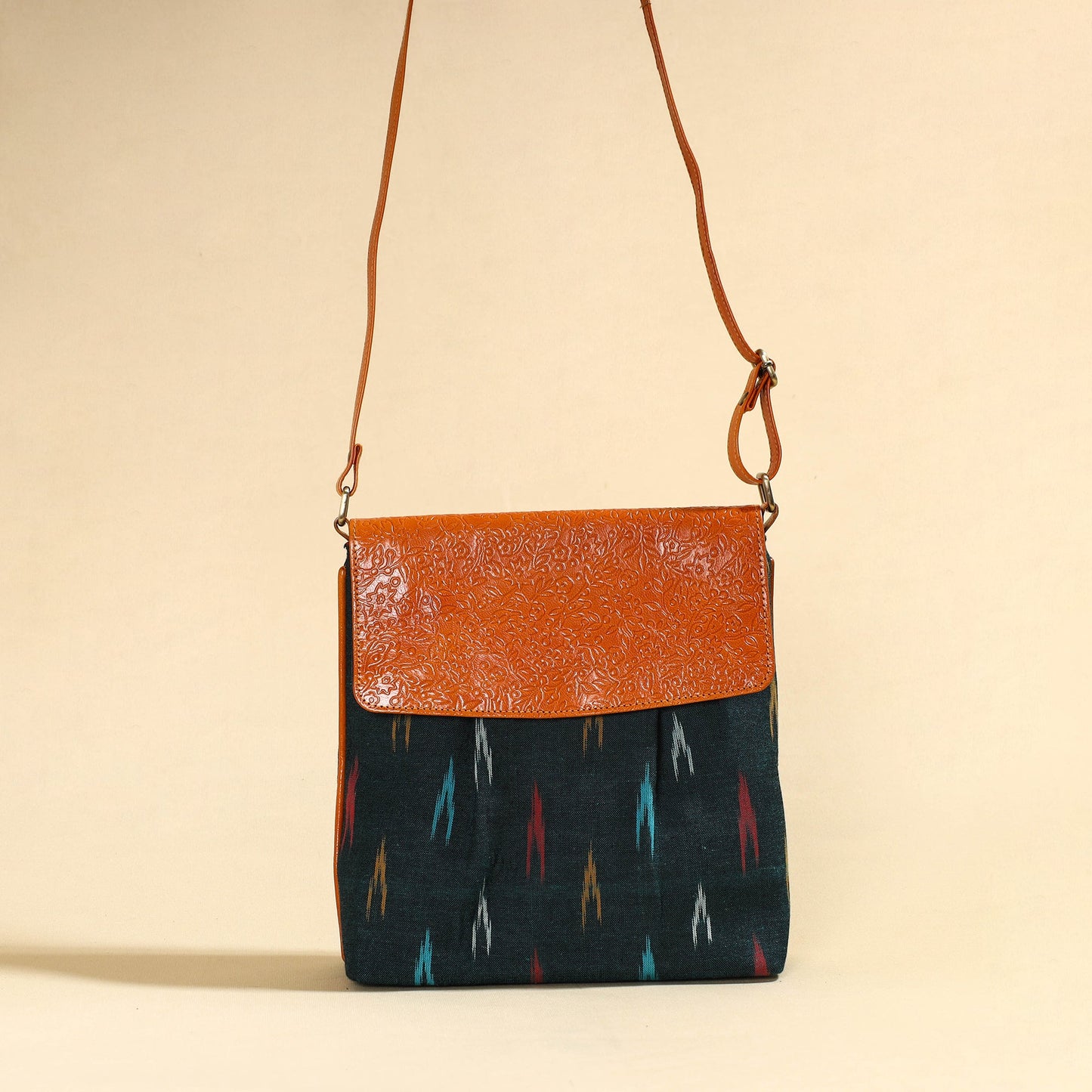 Handcrafted Ikat Fabric Sling Bag with Embossed Leather Flap