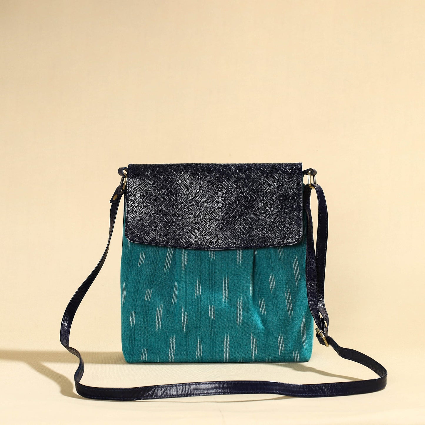 Handcrafted Ikat Fabric Sling Bag with Embossed Leather Flap