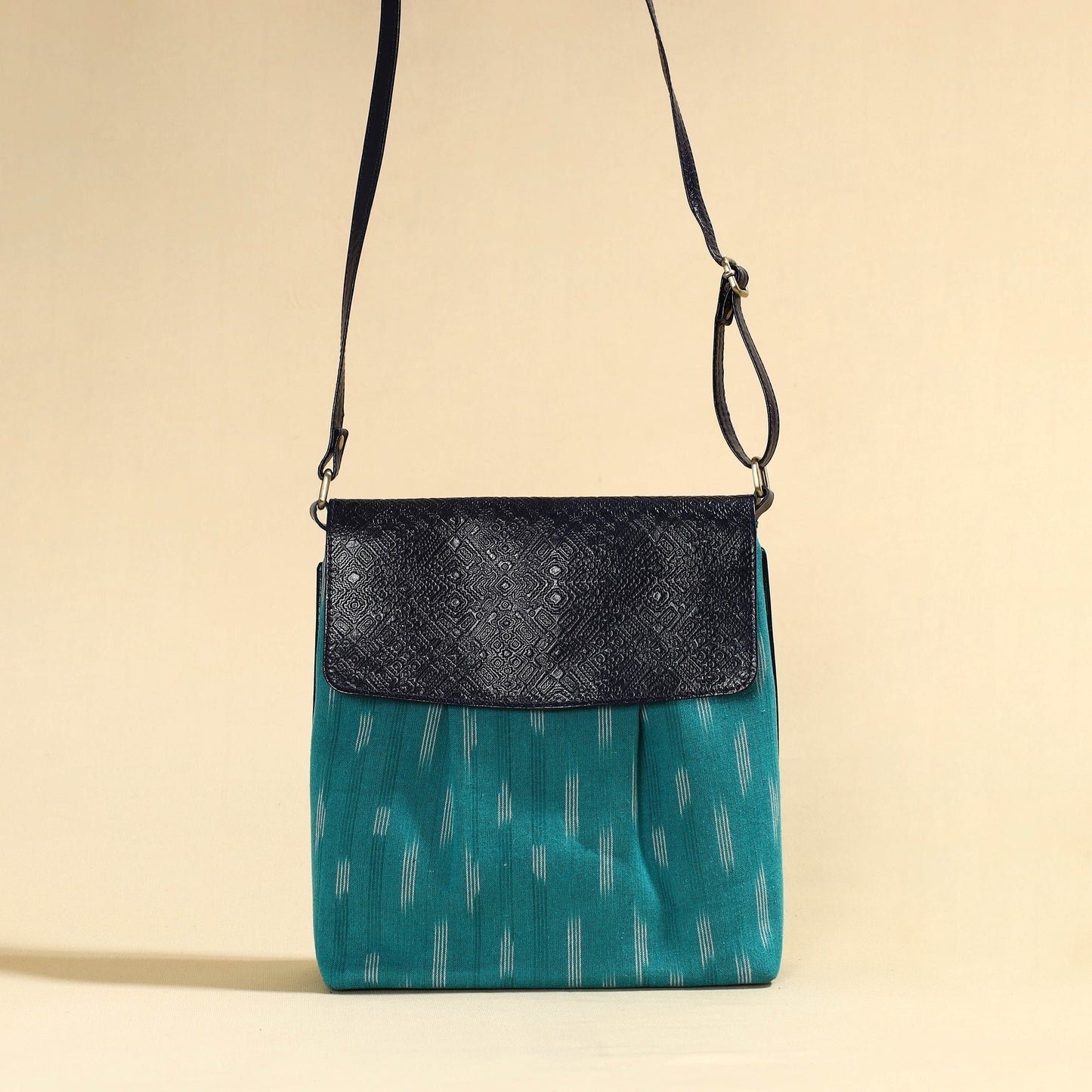 Handcrafted Ikat Fabric Sling Bag with Embossed Leather Flap