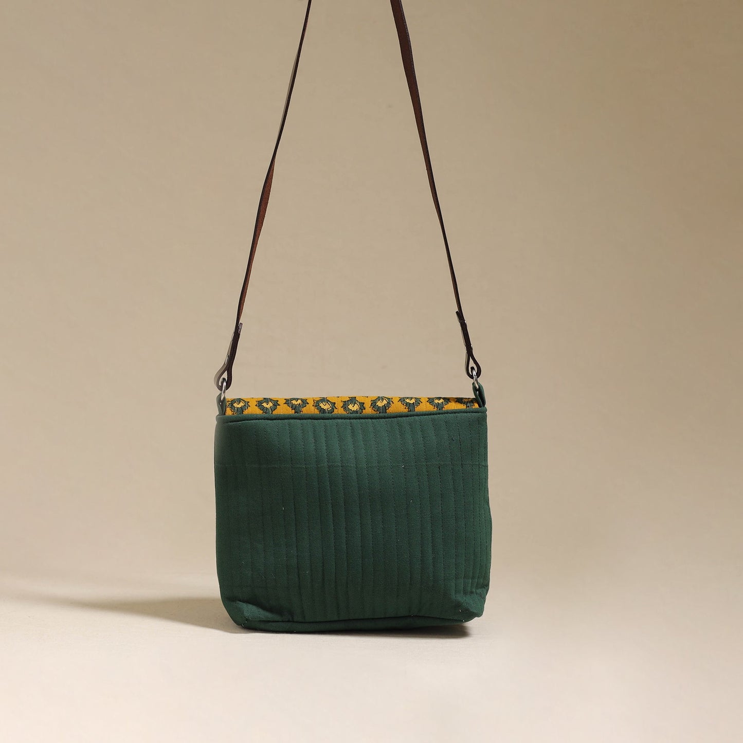 Handcrafted quilted ajrakh block printed fabric sling bag