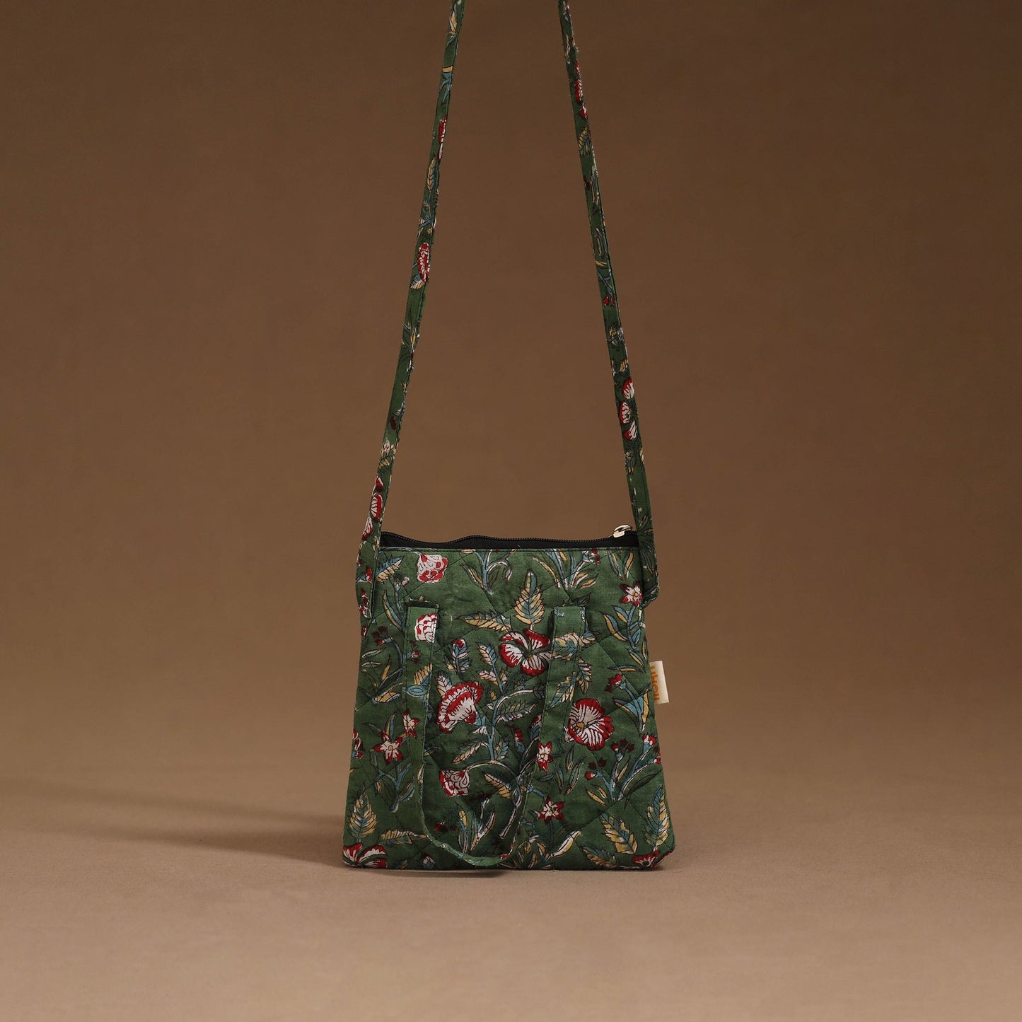 Handcrafted quilted sling bag 10