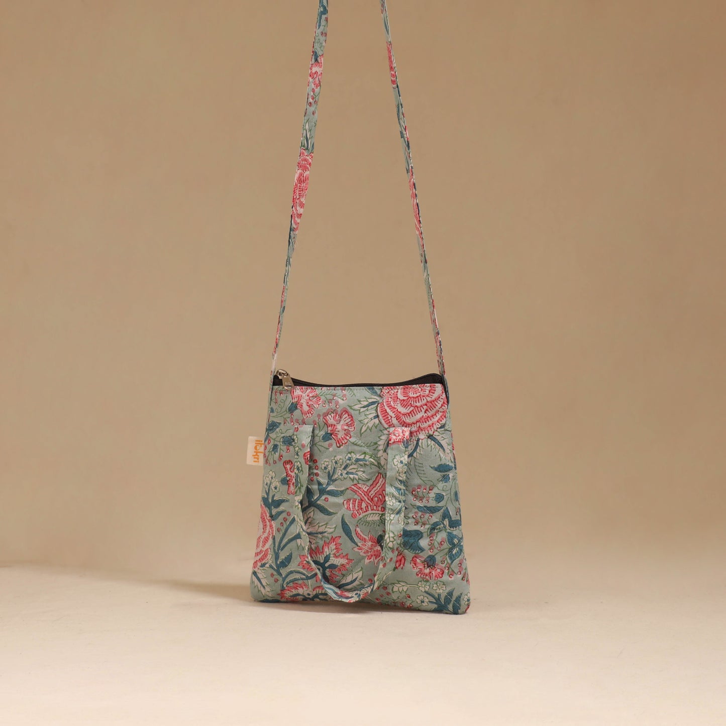Handcrafted quilted sling bag 13