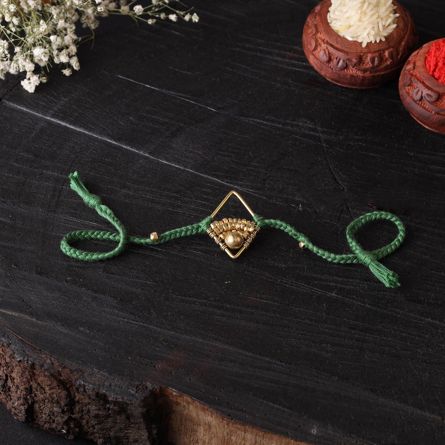Handcrafted tribal dokra brass thread rakhi 58