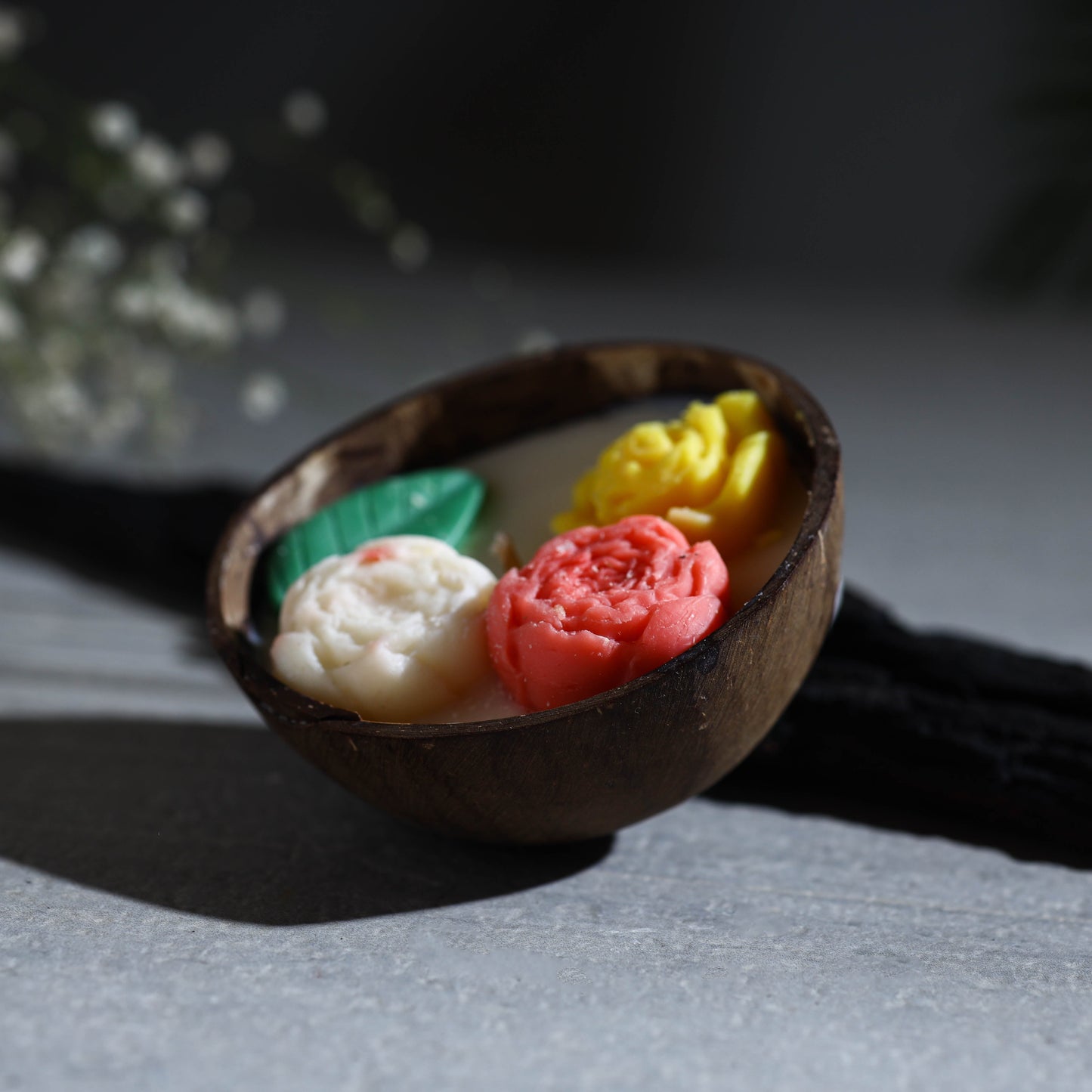Handcrafted eco-friendly coconut shell rose soy scented