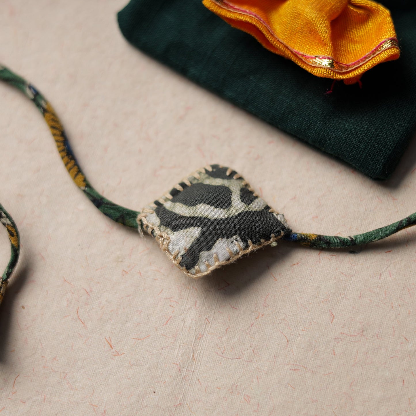 Handcrafted Embroidery Fabart Rakhi 01