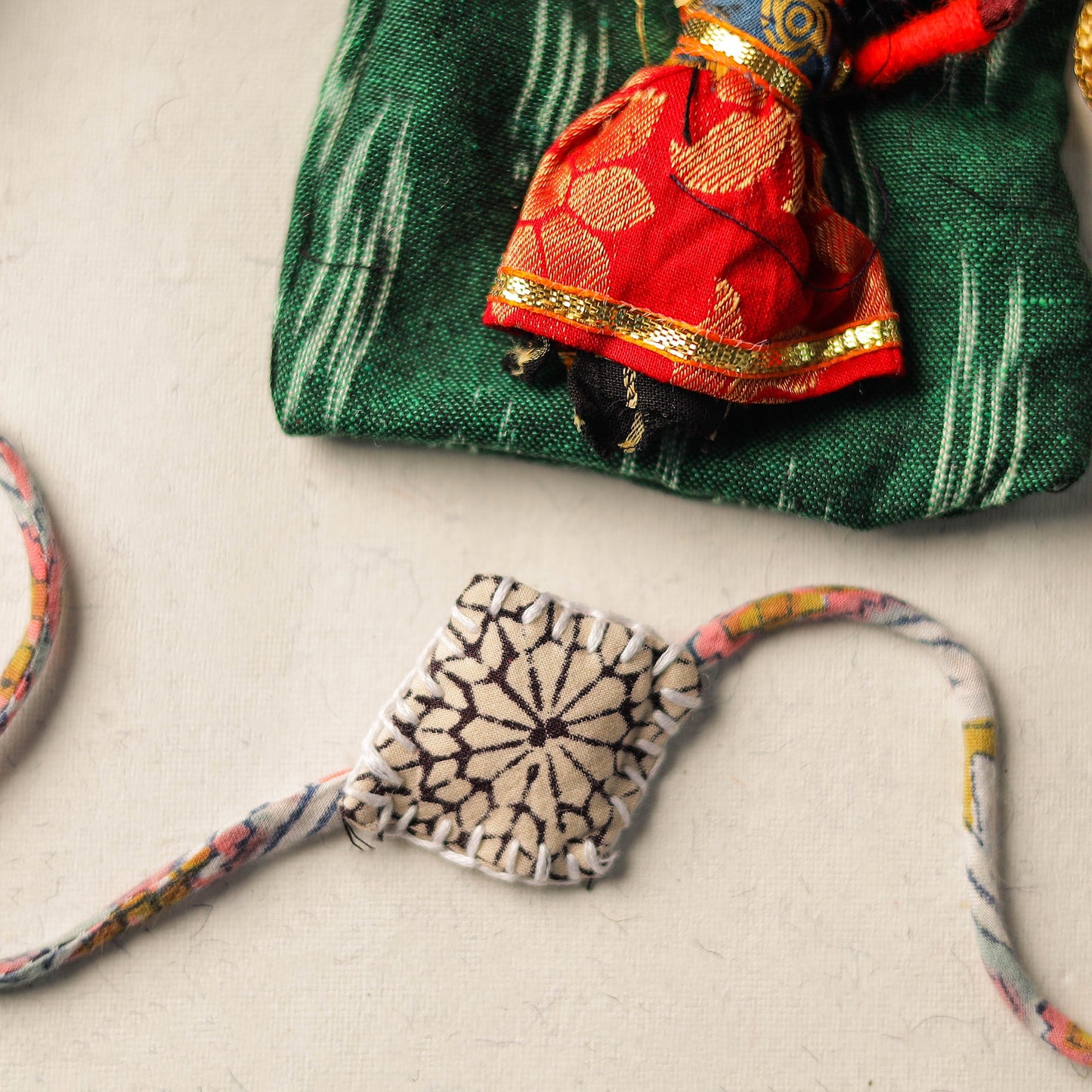 Handcrafted Embroidery Fabart Rakhi 16