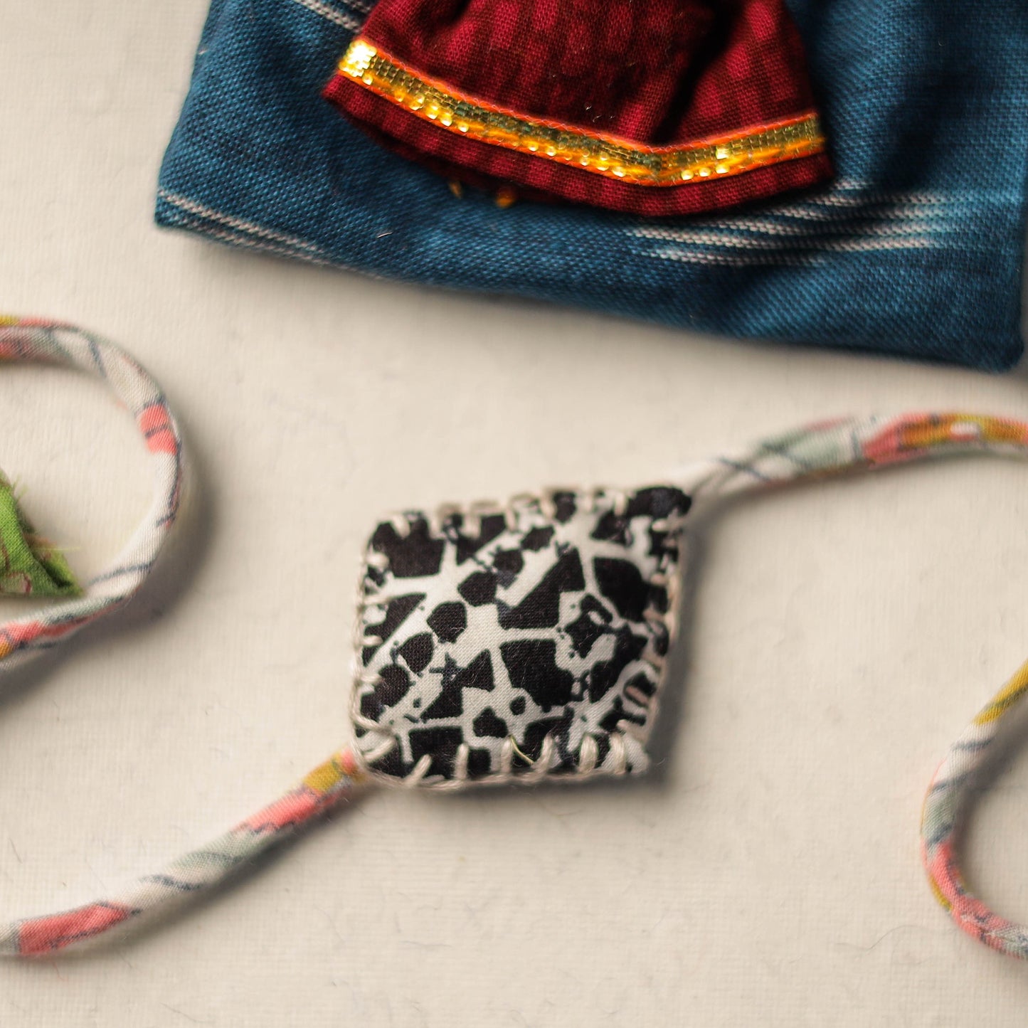 Handcrafted Embroidery Fabart Rakhi 19