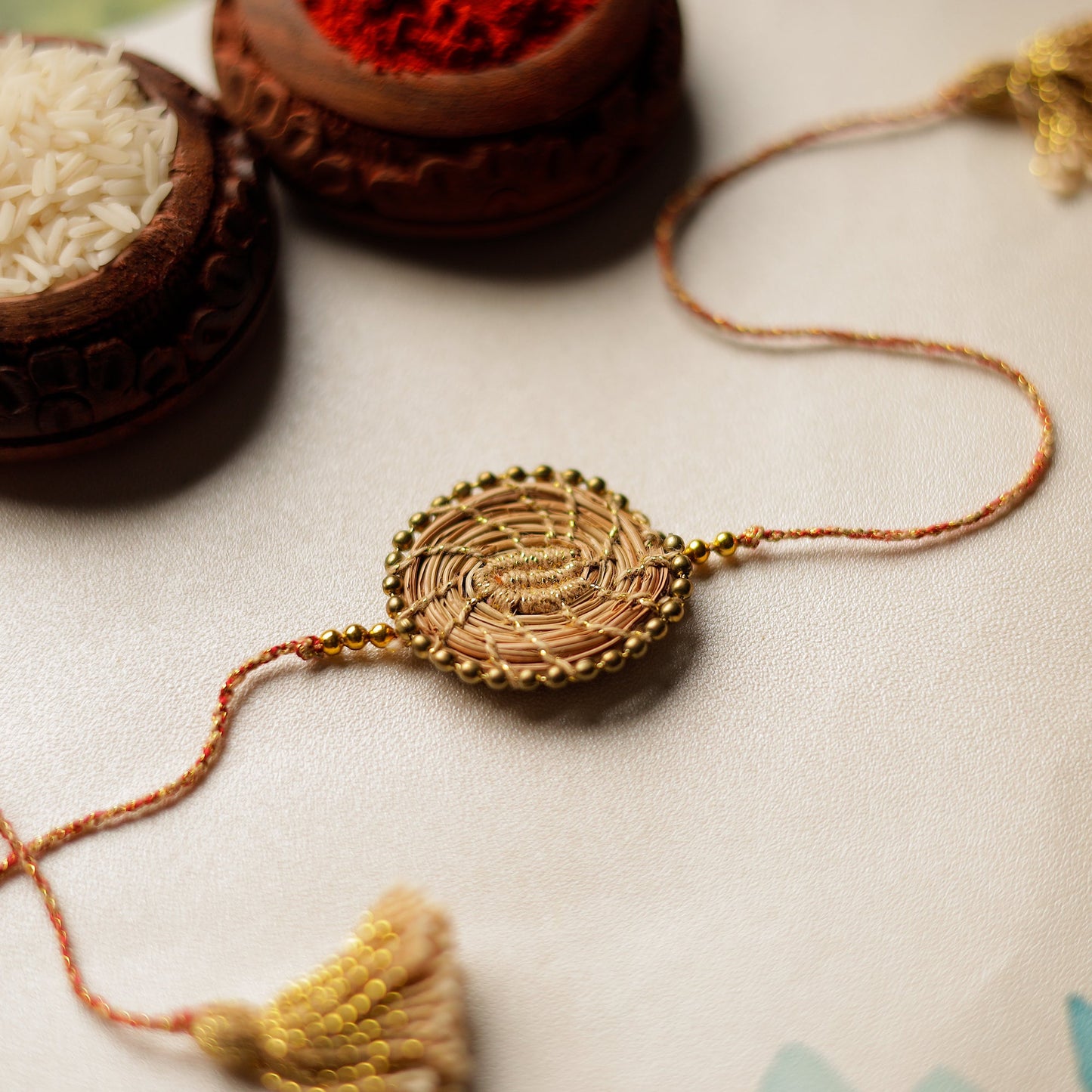Handcrafted Pine Needles Hibiscus Rakhi by Pirul