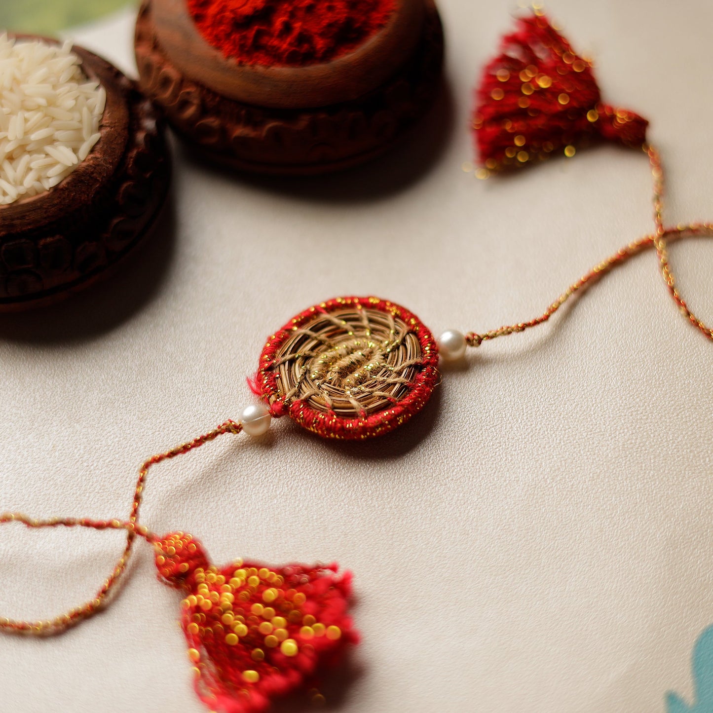 Handcrafted Pine Needles Hibiscus Rakhi by Pirul
