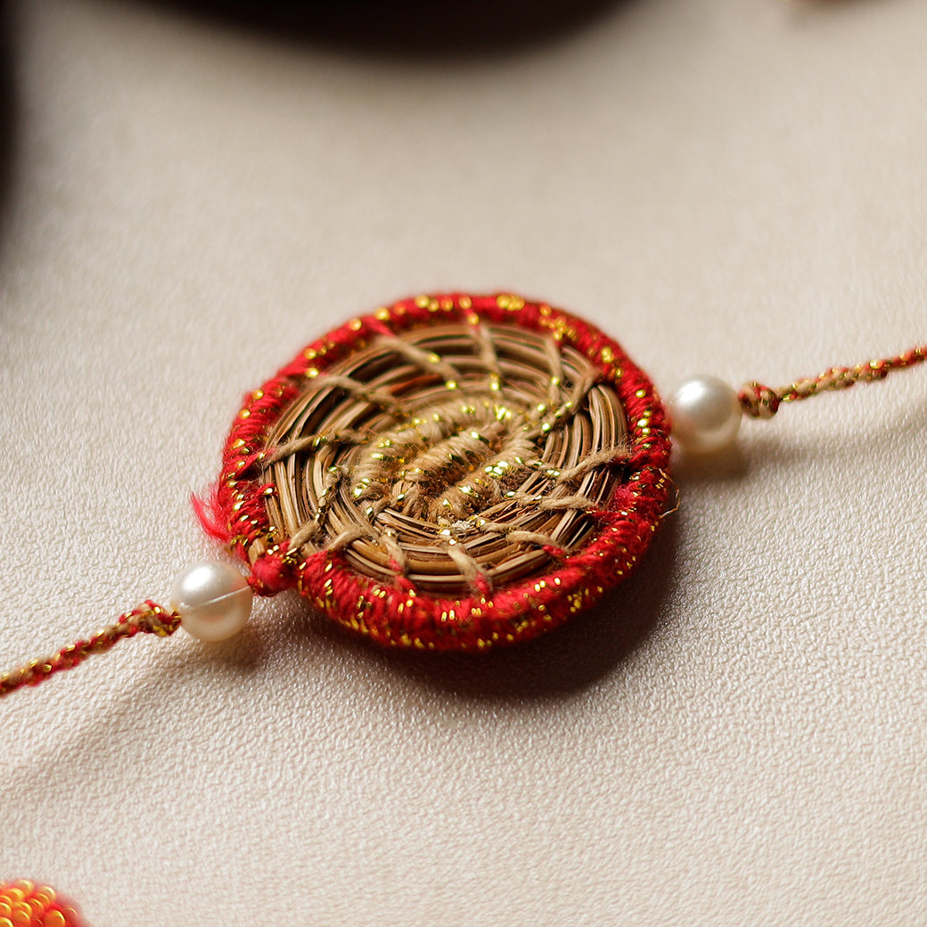 Handcrafted Pine Needles Hibiscus Rakhi by Pirul