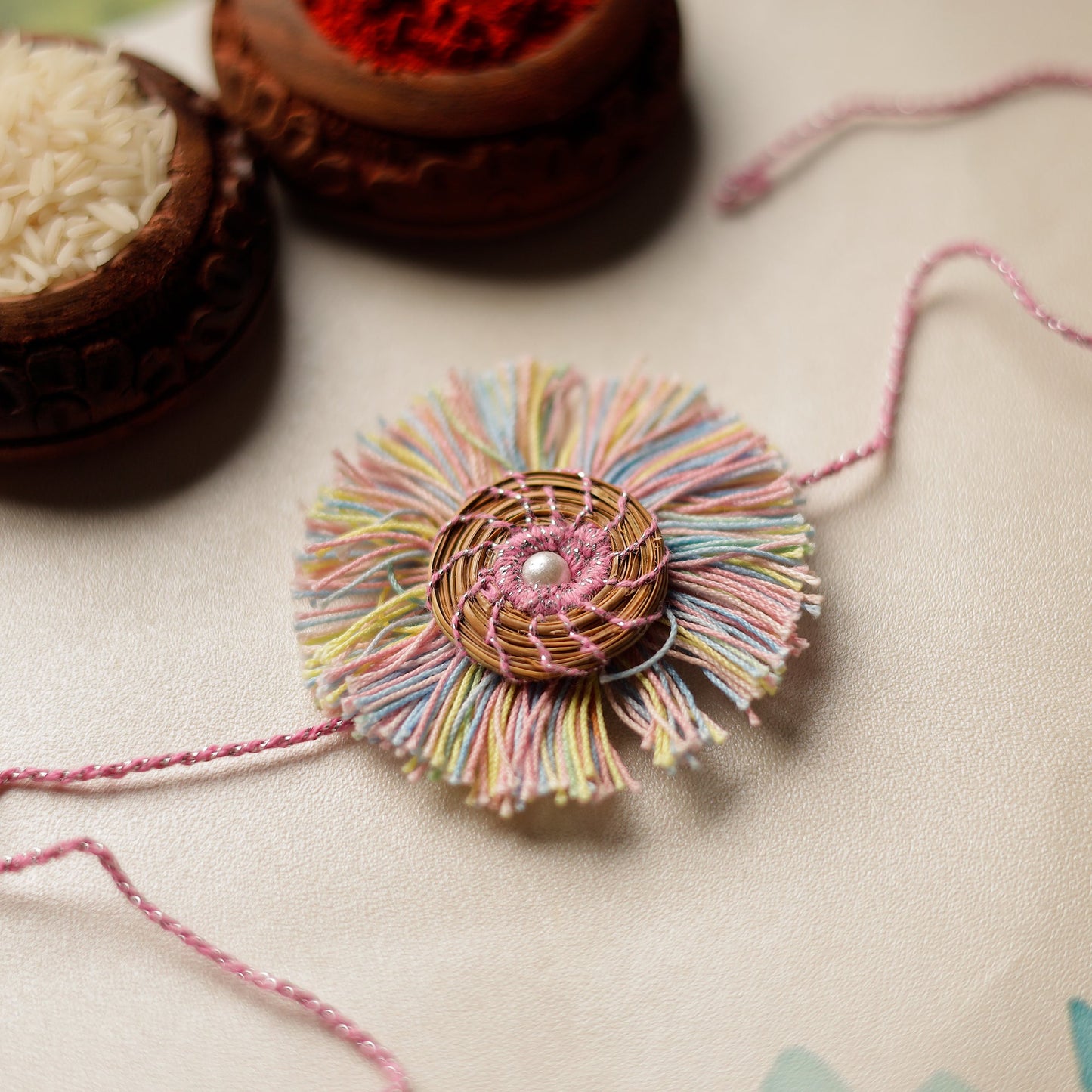 Handcrafted Pine Needles Hibiscus Rakhi by Pirul