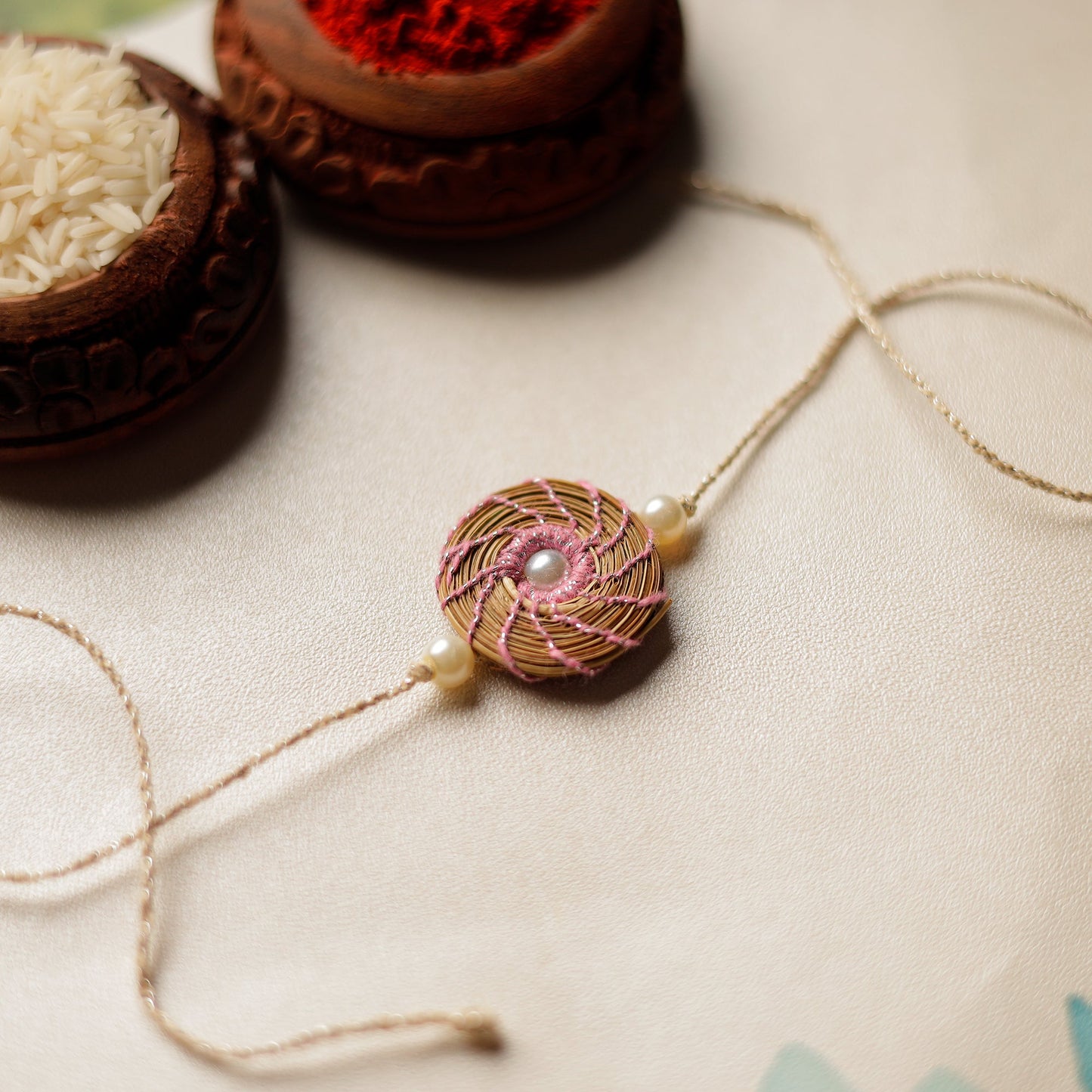Handcrafted Pine Needles Hibiscus Rakhi by Pirul