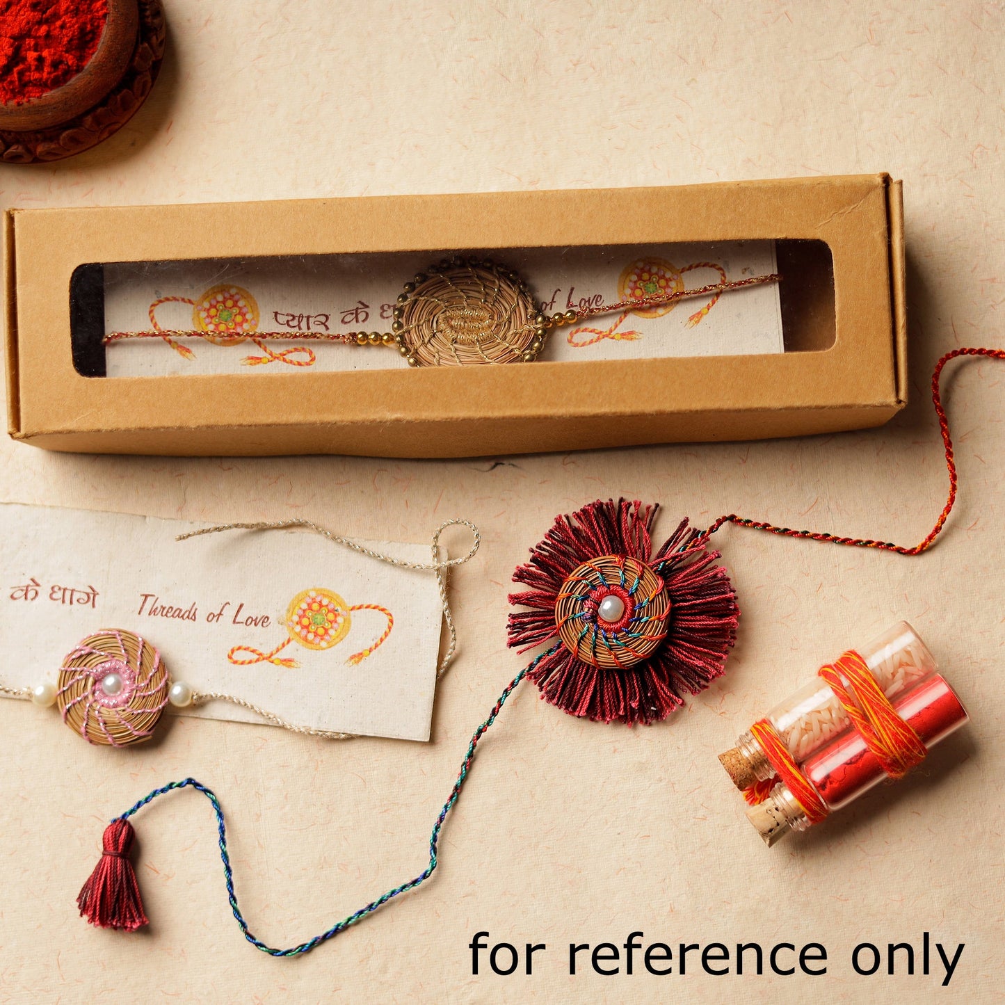Handcrafted Pine Needles Hibiscus Rakhi by Pirul