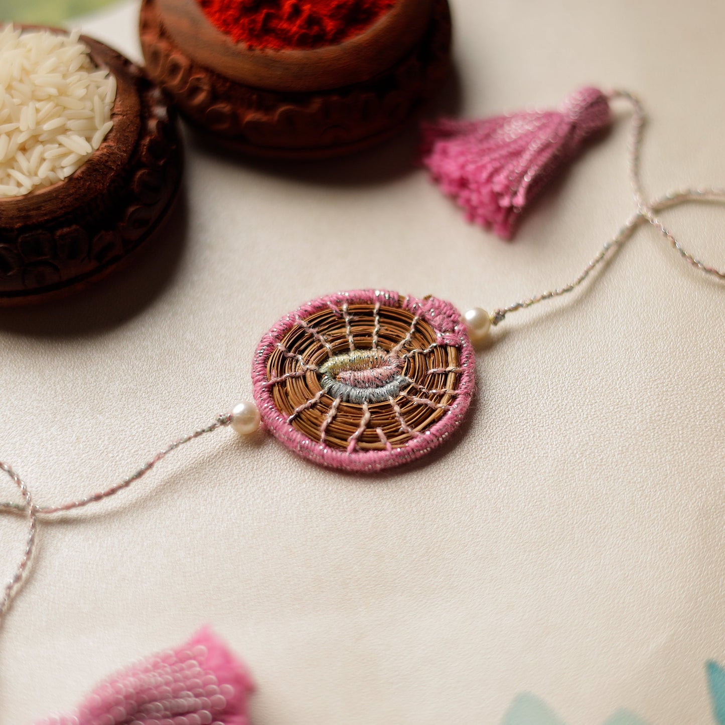 Handcrafted Pine Needles Hibiscus Rakhi by Pirul
