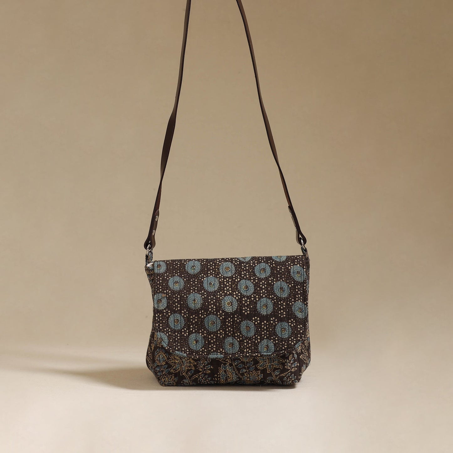 Handcrafted quilted ajrakh block printed fabric sling bag