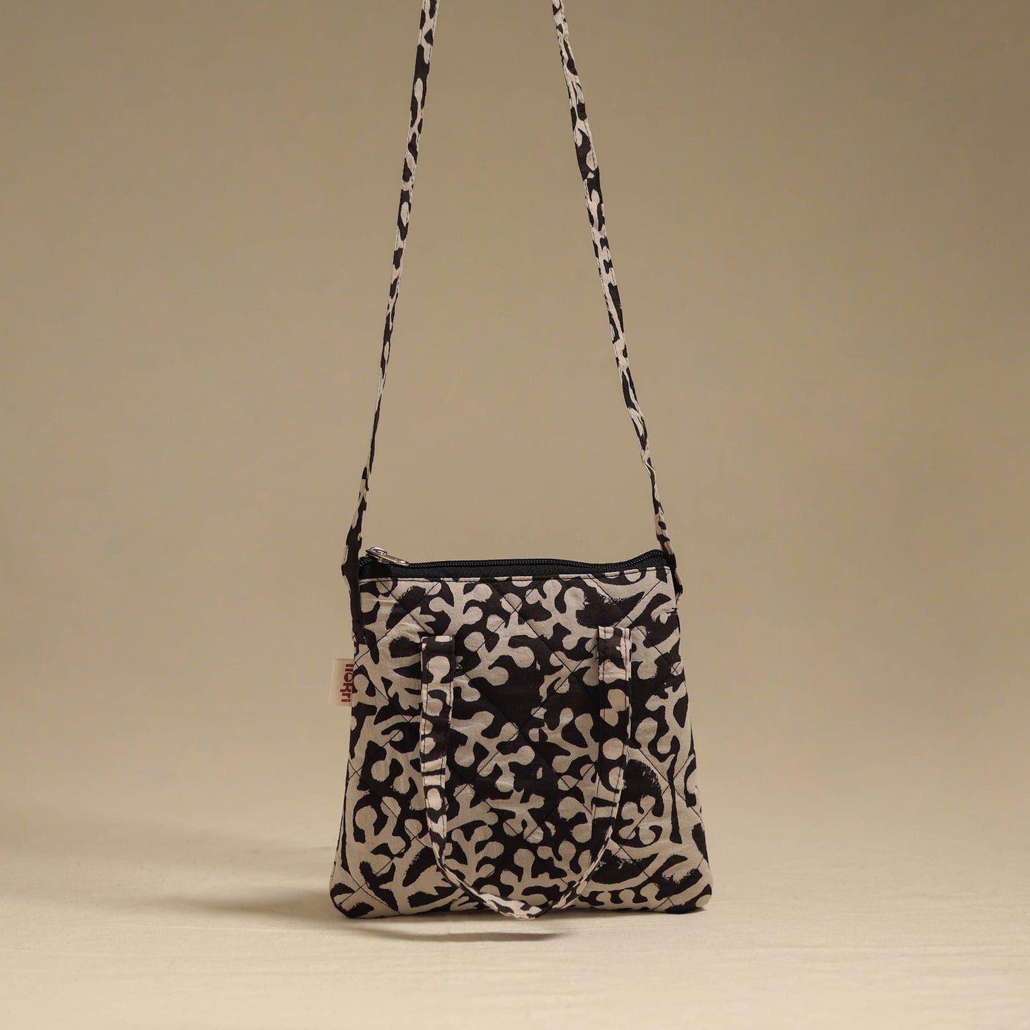 Handcrafted quilted sling bag 09