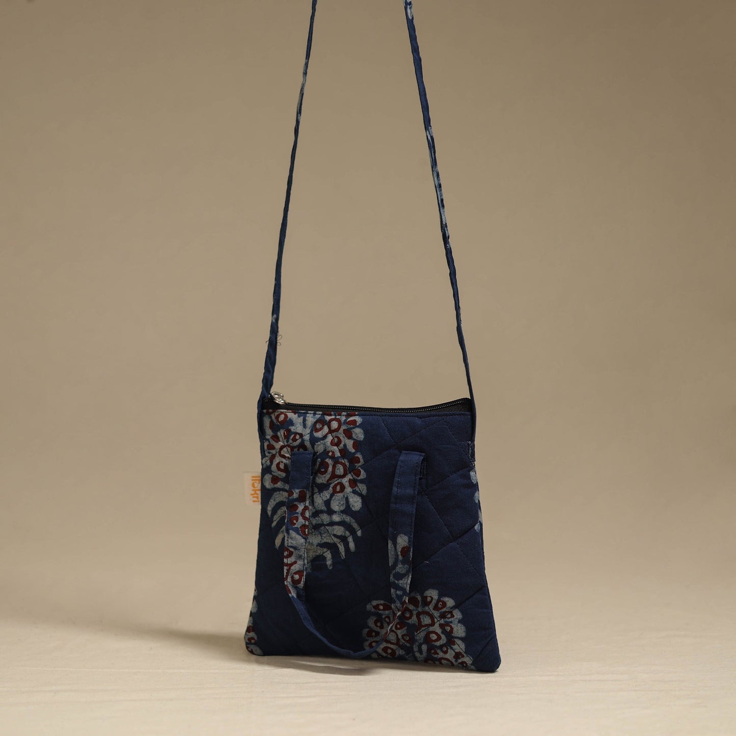 Handcrafted quilted sling bag 17