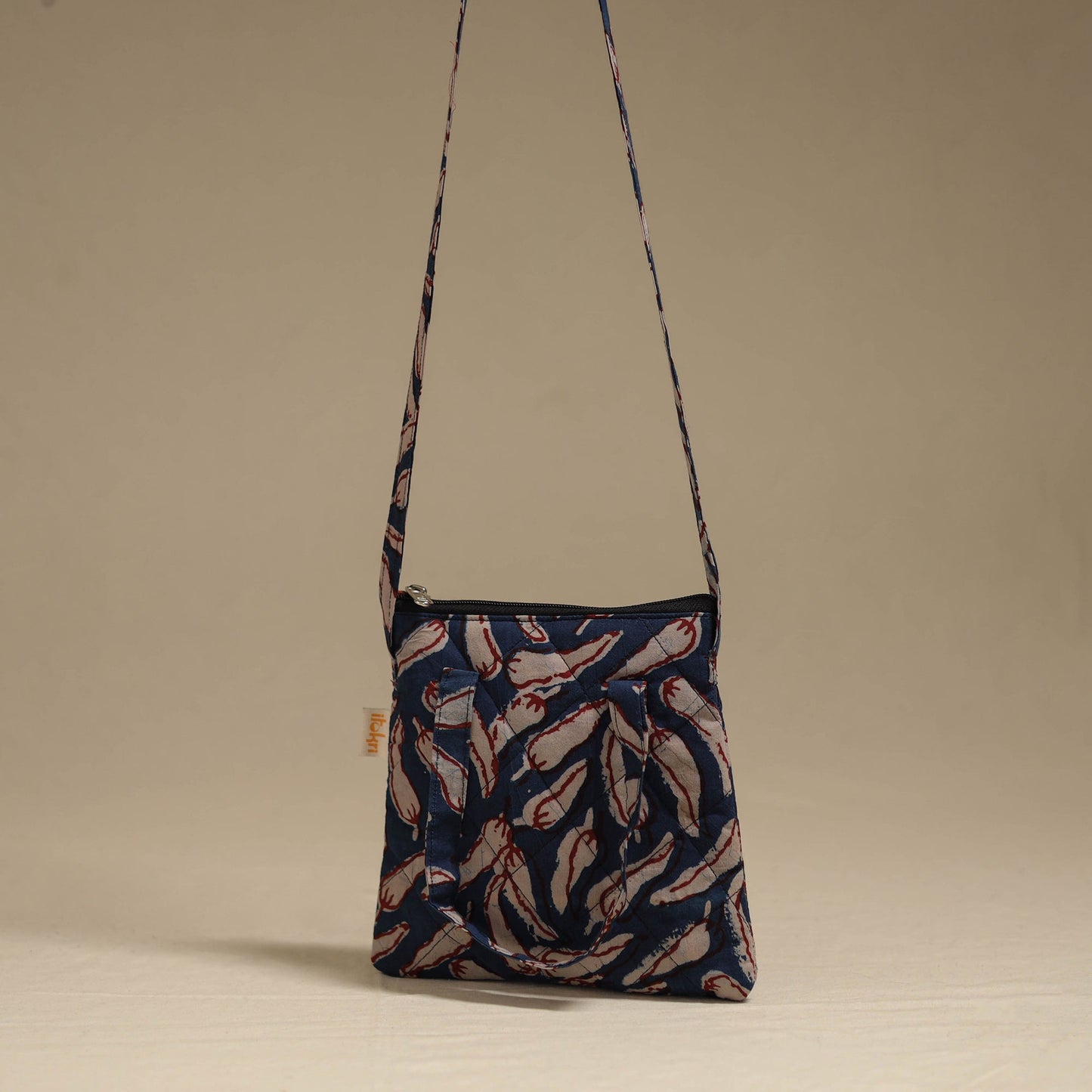Handcrafted quilted sling bag 19