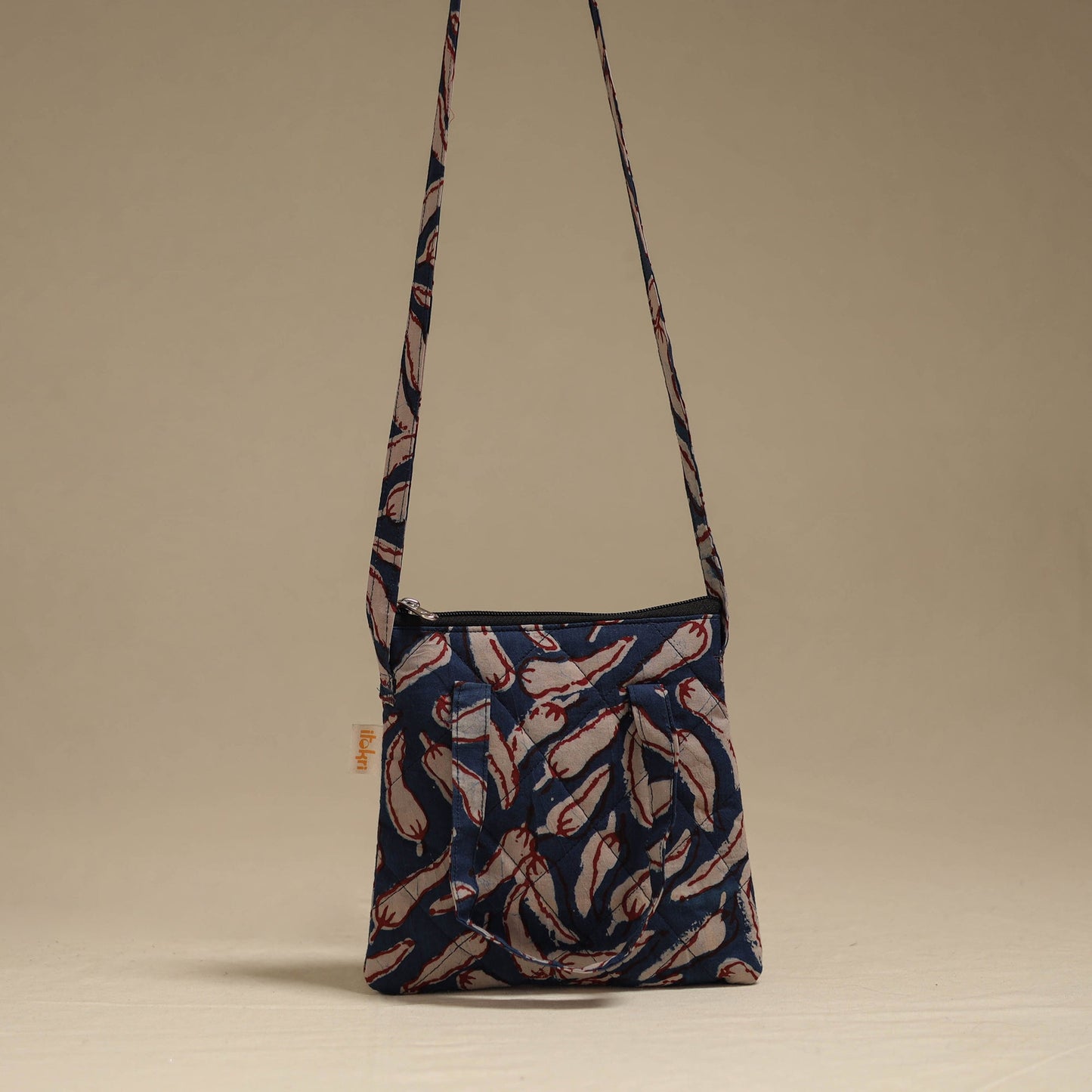 Handcrafted quilted sling bag 19
