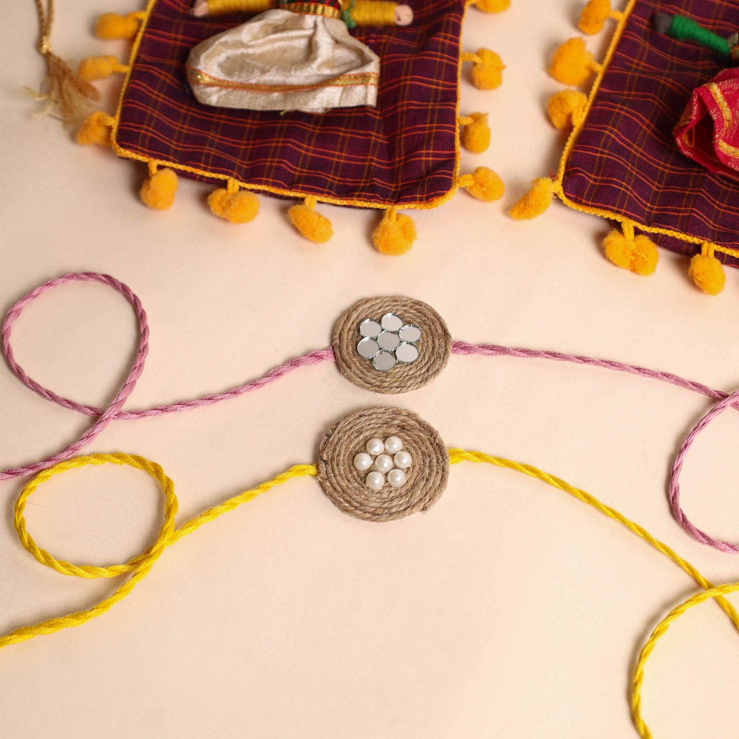 Handmade Bead & Mirror Work Jute Rakhi (Set of 2)