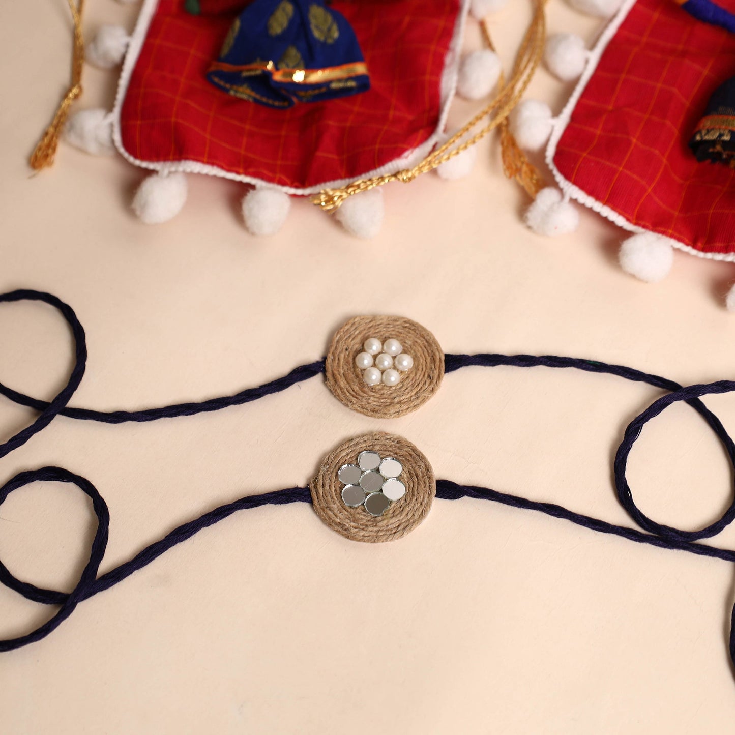 Handmade Bead & Mirror Work Jute Rakhi (Set of 2)